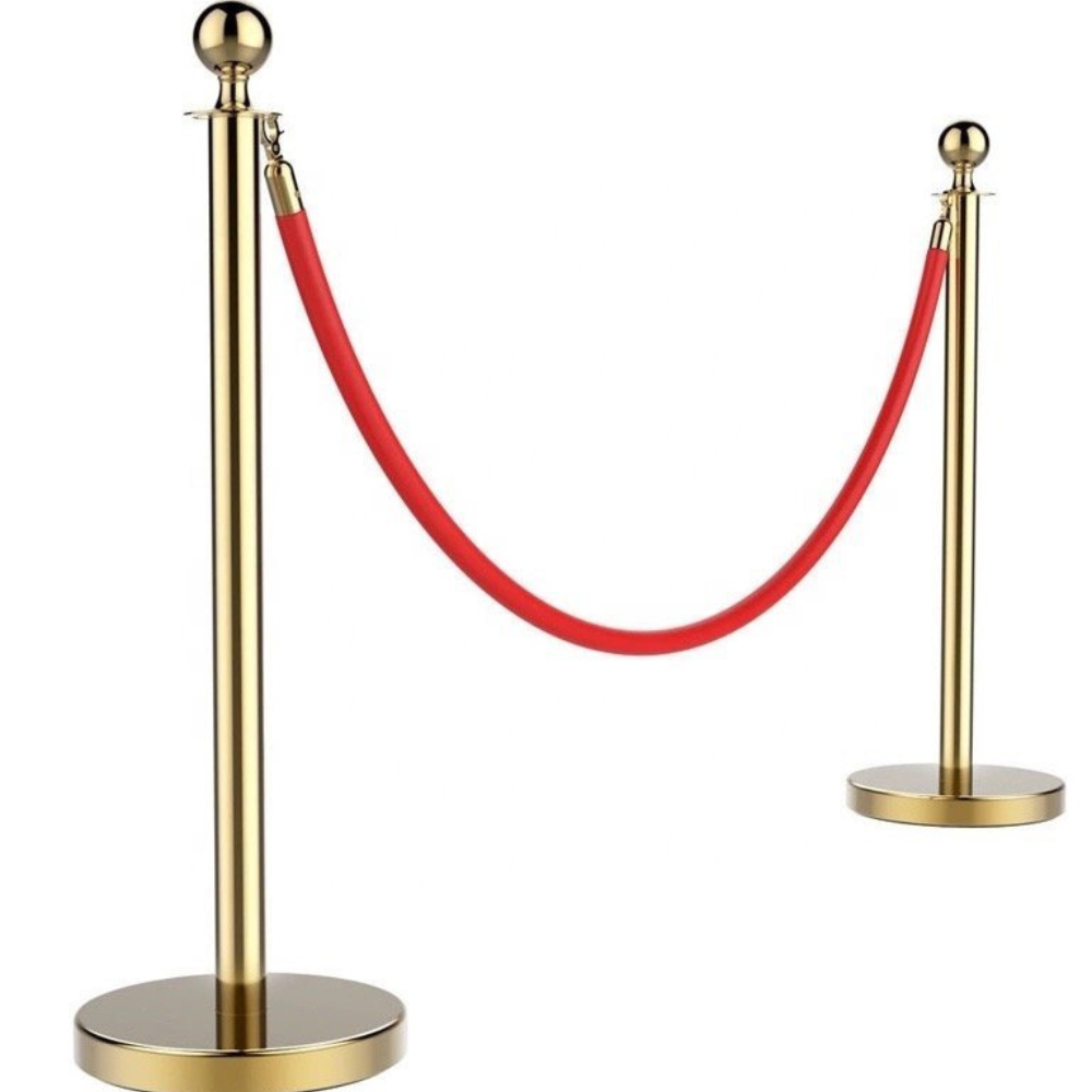Gouden afzetpalen met rood koord